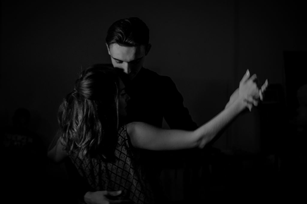 Grey scale photo of a couple dancing